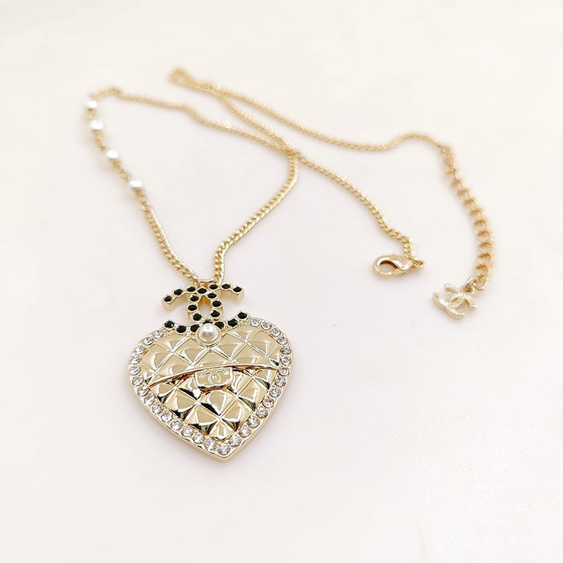 18K  Chanel Heart Necklace