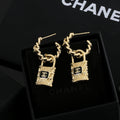 18K  Chanel Lock Earrings