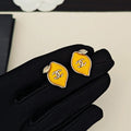 18K  Chanel Yellow Leaf Gold Earrings