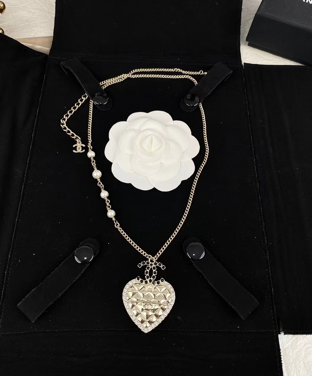 18K  Chanel Heart Necklace