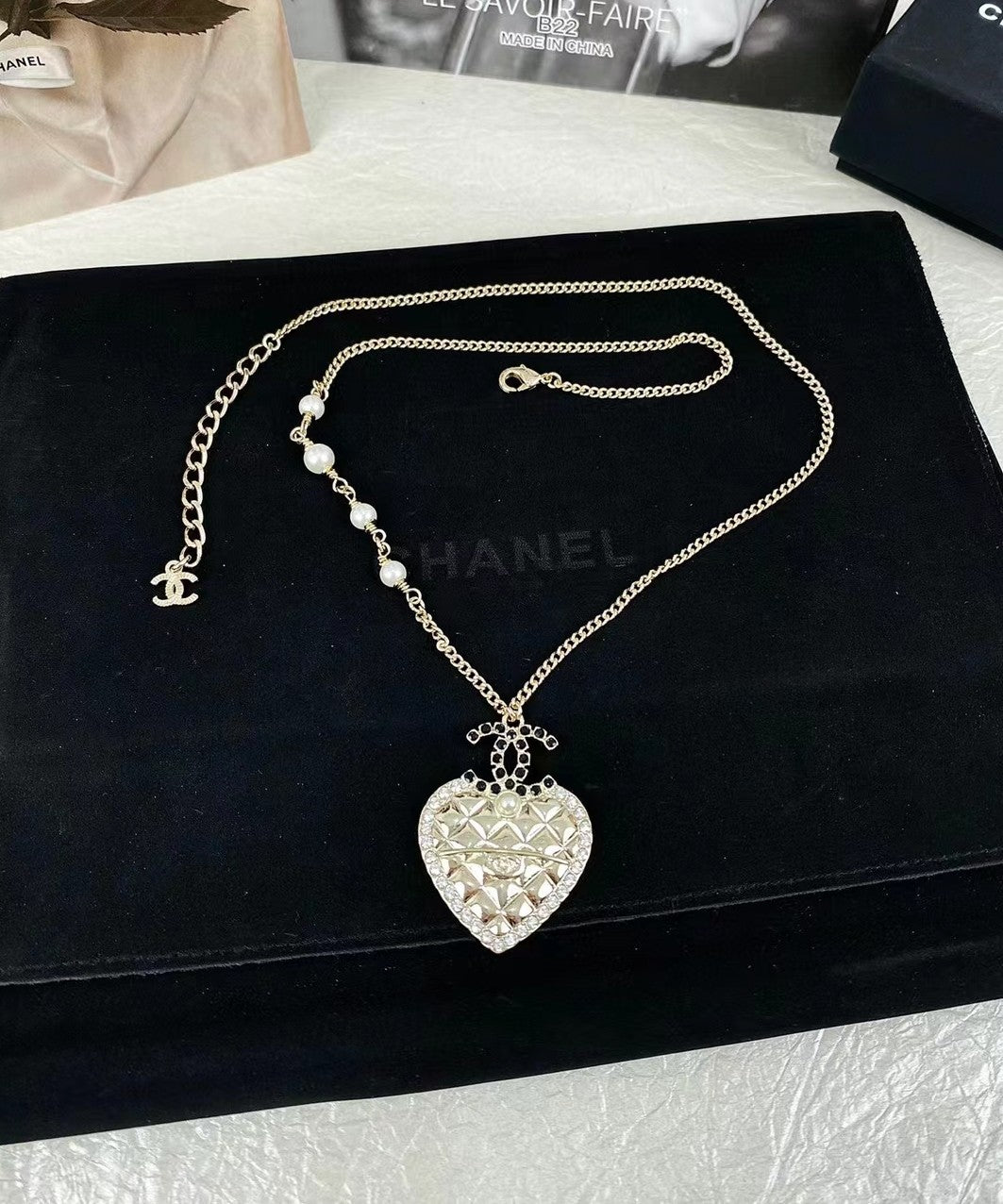 18K  Chanel Heart Necklace