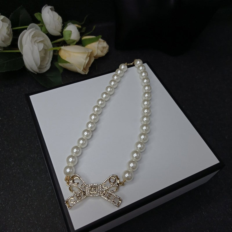 18K  Chanel Bow Pearl Necklace