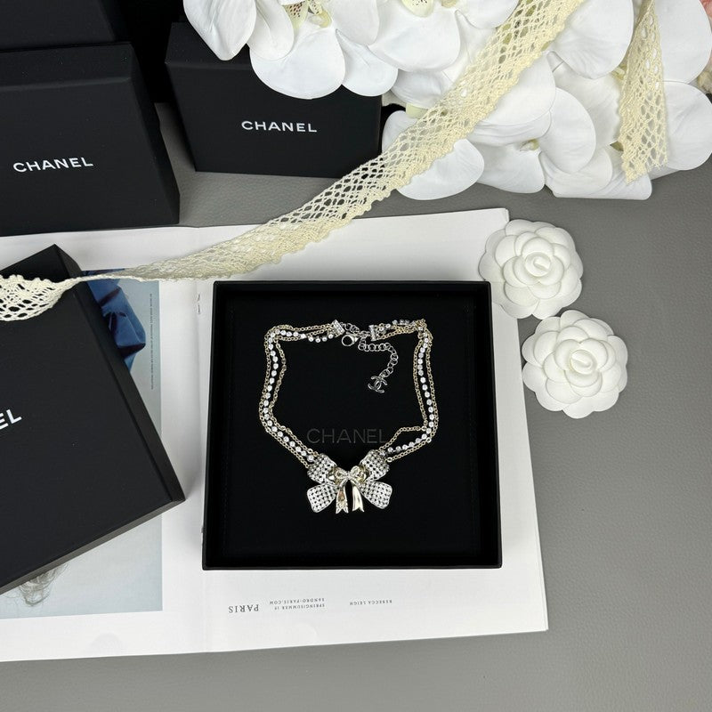 18K  Chanel 25K Bow Tie Choker Necklace